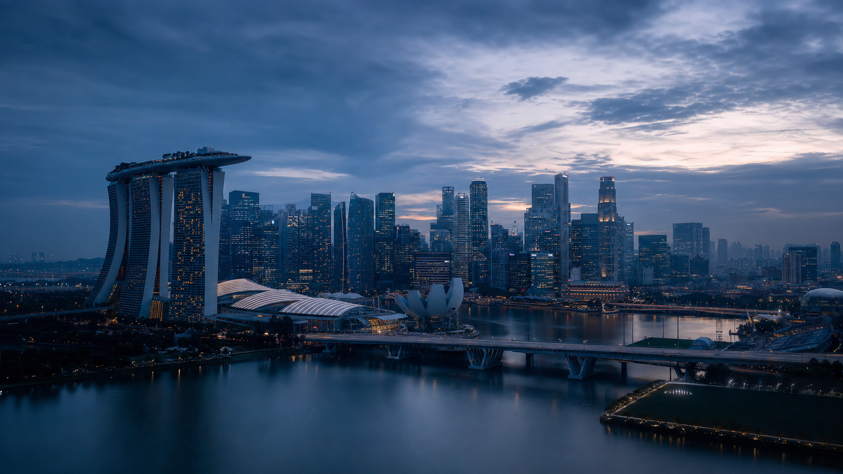 Singapore skyline at blue hour over Marina Bay
